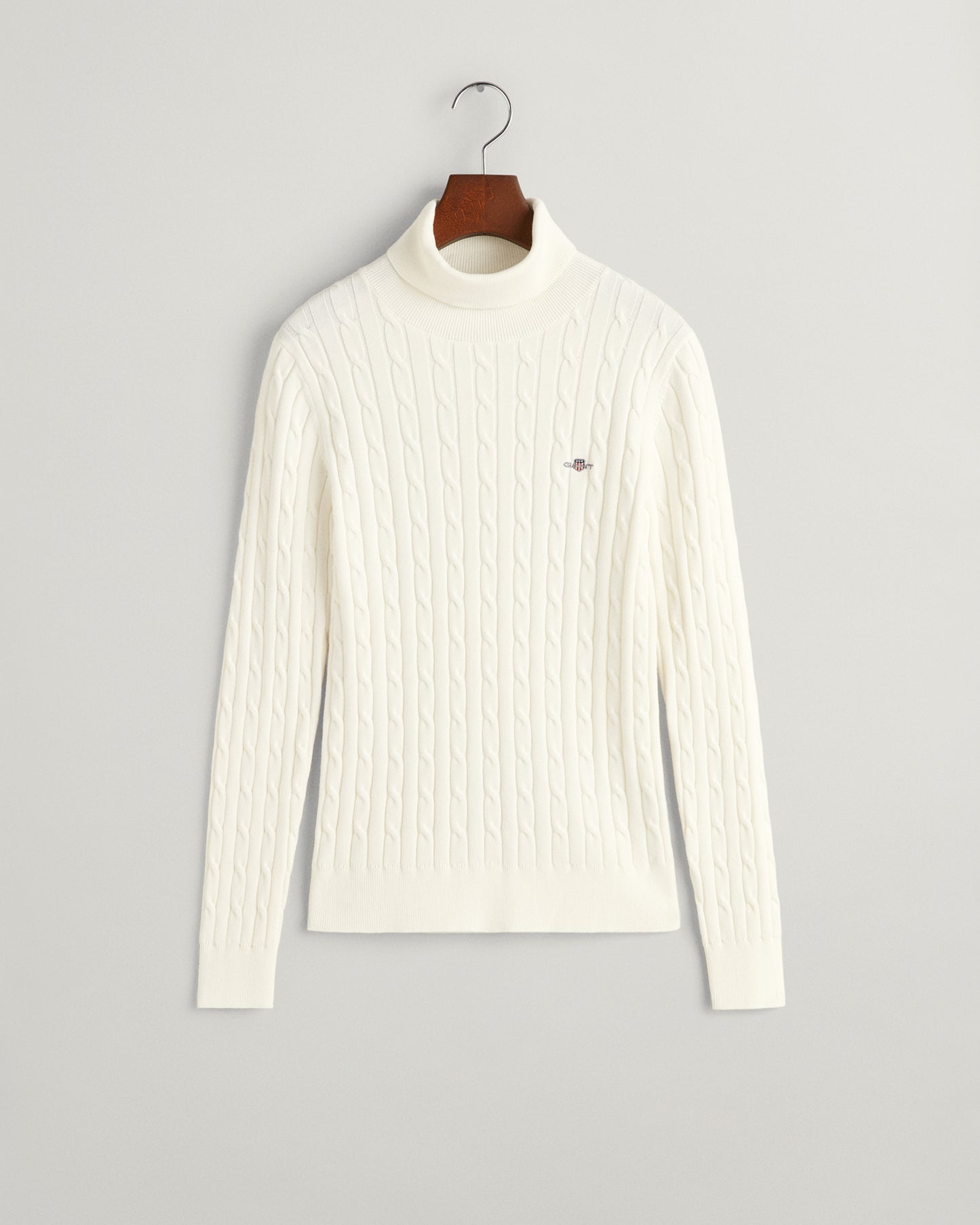 EGGSHELL, STRETCH COTTON CABLE TURTLENECK, FLAT-LAY BY GANT AU.