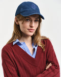 MODEL WEARING WIDE RIBBED WOOL V-NECK