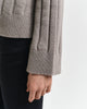 MODEL WEARING WIDE RIBBED WOOL STAND COLLAR