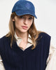 MODEL WEARING WIDE RIBBED WOOL V-NECK VEST