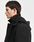 MODEL WEARING PADDED CAR COAT