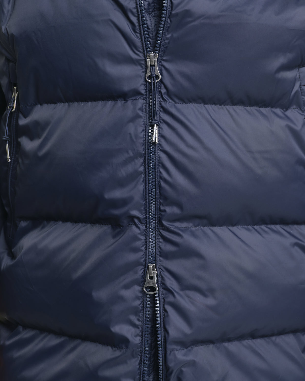 MODEL WEARING ACTIVE CLOUD MID LENGTH JACKET