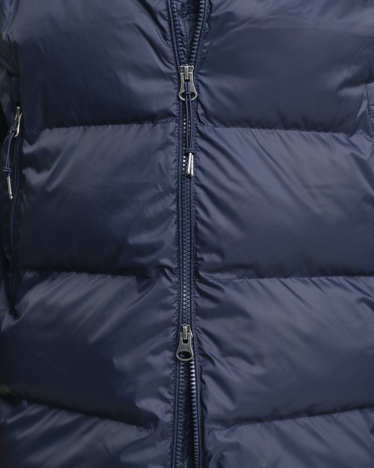 MODEL WEARING ACTIVE CLOUD MID LENGTH JACKET