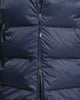 MODEL WEARING ACTIVE CLOUD MID LENGTH JACKET
