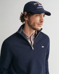 MODEL WEARING COTTON MICRO TEXTURED HALF ZIP