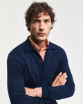 MODEL WEARING EXTRAFINE MERINO WOOL POLO