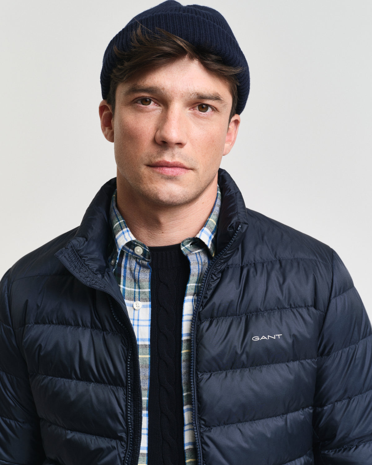 MODEL WEARING LIGHT DOWN JACKET