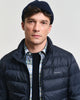 MODEL WEARING LIGHT DOWN JACKET