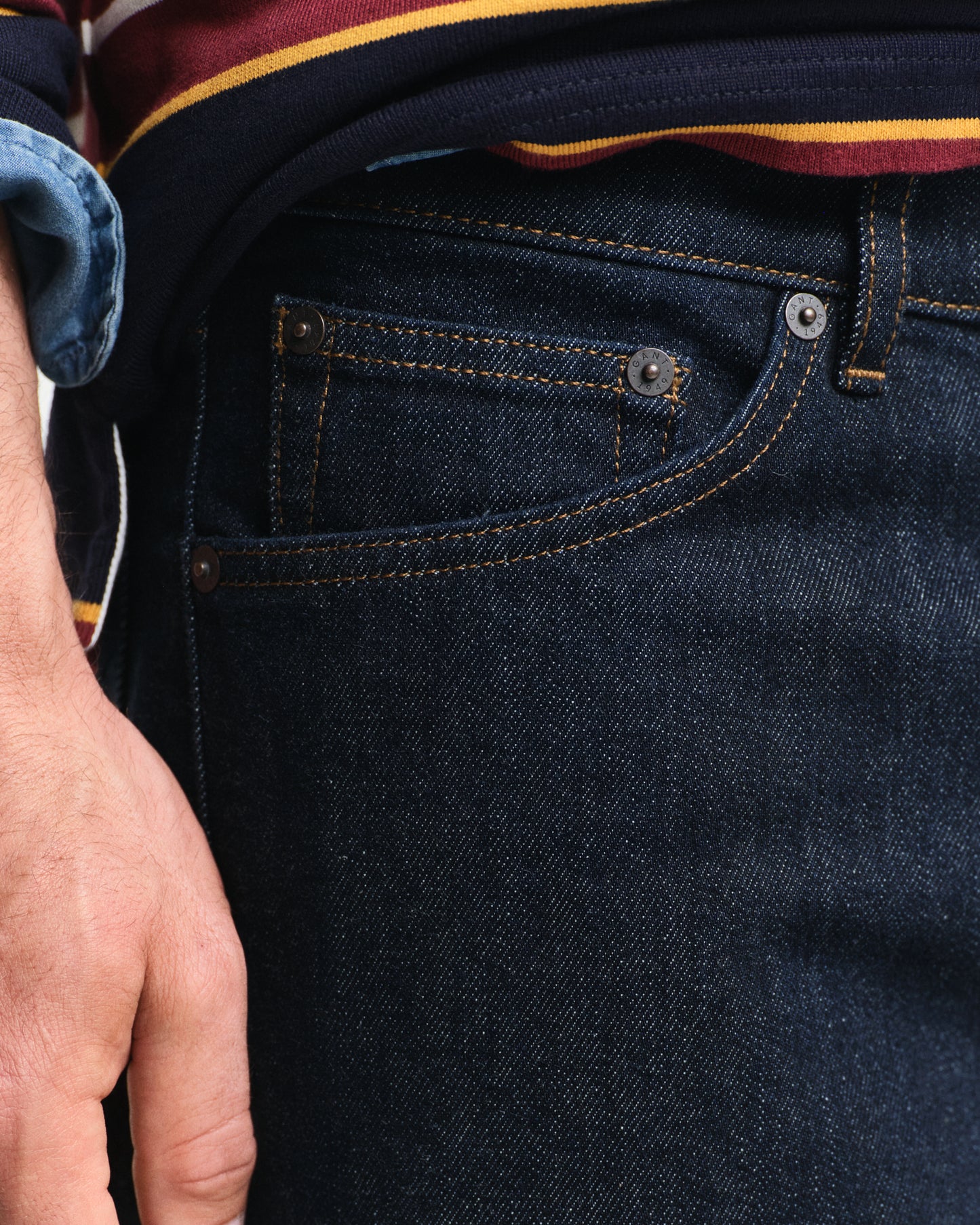 MODEL WEARING REGULAR GANT JEANS