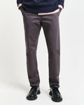 MODEL WEARING SLIM TWILL CHINOS