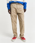 MODEL WEARING STRAIGHT FIT EMB CHINOS