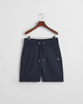 EVENING BLUE, REG SHIELD SWEAT SHORTS, FLAT-LAY BY GANT AU.