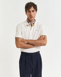 CREAM, TEXTURED POLO, FRONT-VIEW BY GANT AU.