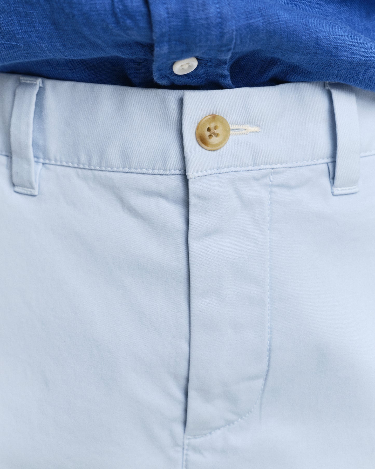 MODEL WEARING REG SUNFADED CHINO SHORTS