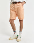 MODEL WEARING REG SUNFADED CHINO SHORTS