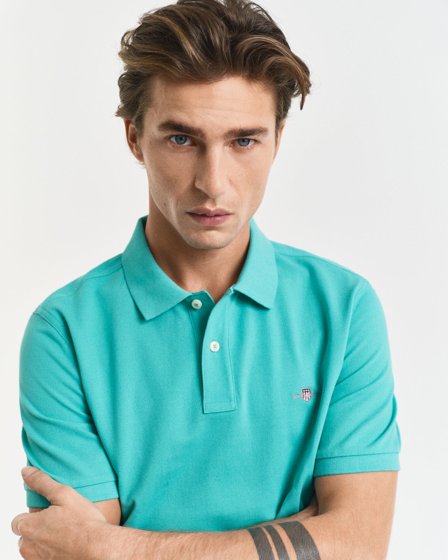 TROPIC BLUE, REG SHIELD SS PIQUE POLO, CLOSE-UP BY GANT AU.