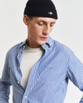 MODEL WEARING REG CLASSIC POPLIN STRIPE SHIRT