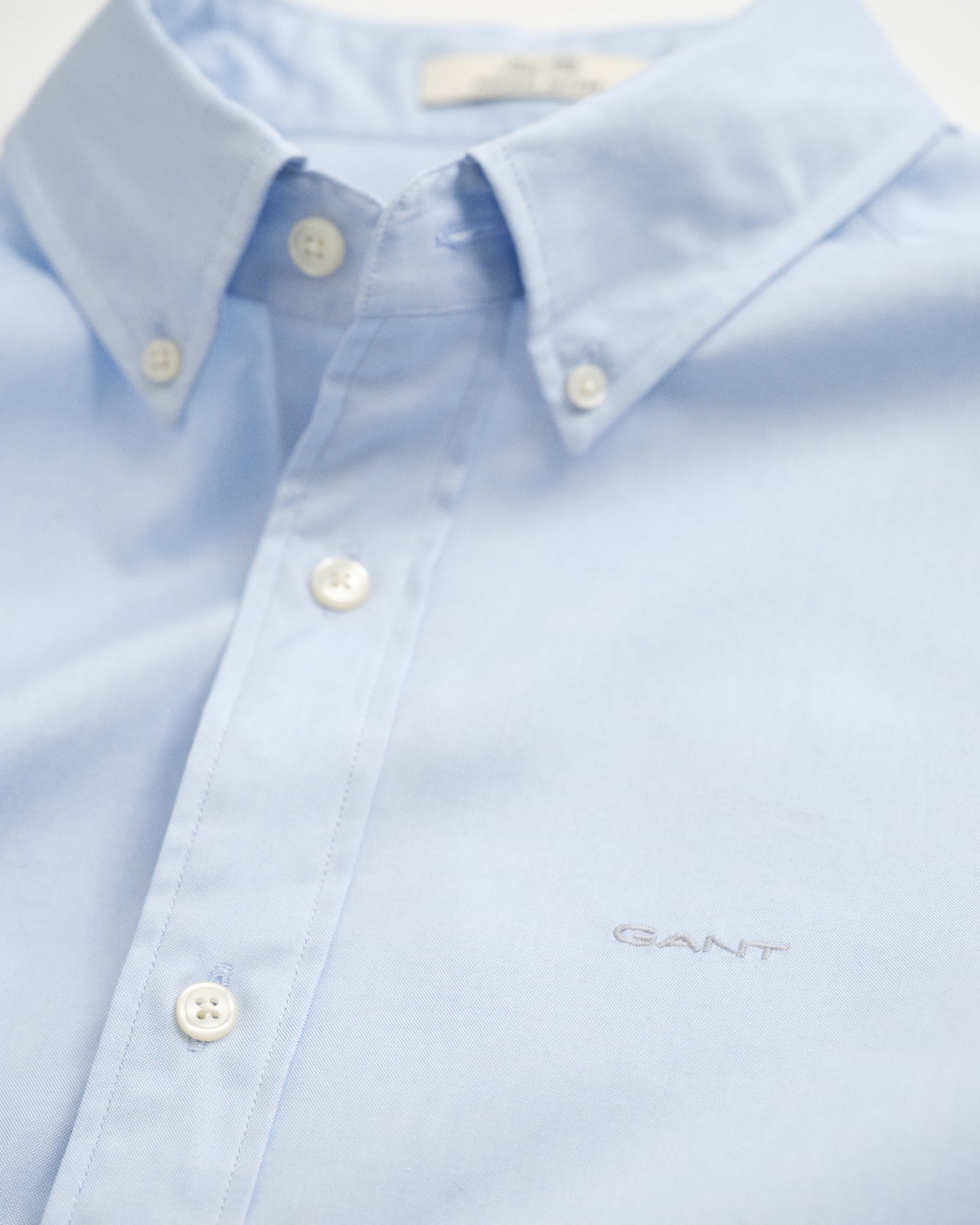 LIGHT BLUE, SLIM PINPOINT OXFORD SHIRT, FLAT-LAY BY GANT AU.