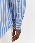 MODEL WEARING REG CLASSIC POPLIN STRIPE SHIRT