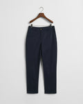 EVENING BLUE, SLIM CHINOS, FLAT-LAY BY GANT AU.