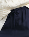 MODEL WEARING FLUID DRAWSTRING PANTS