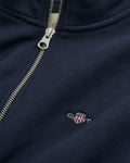 EVENING BLUE, SHIELD HALF-ZIP, CLOSE-UP BY GANT AU.