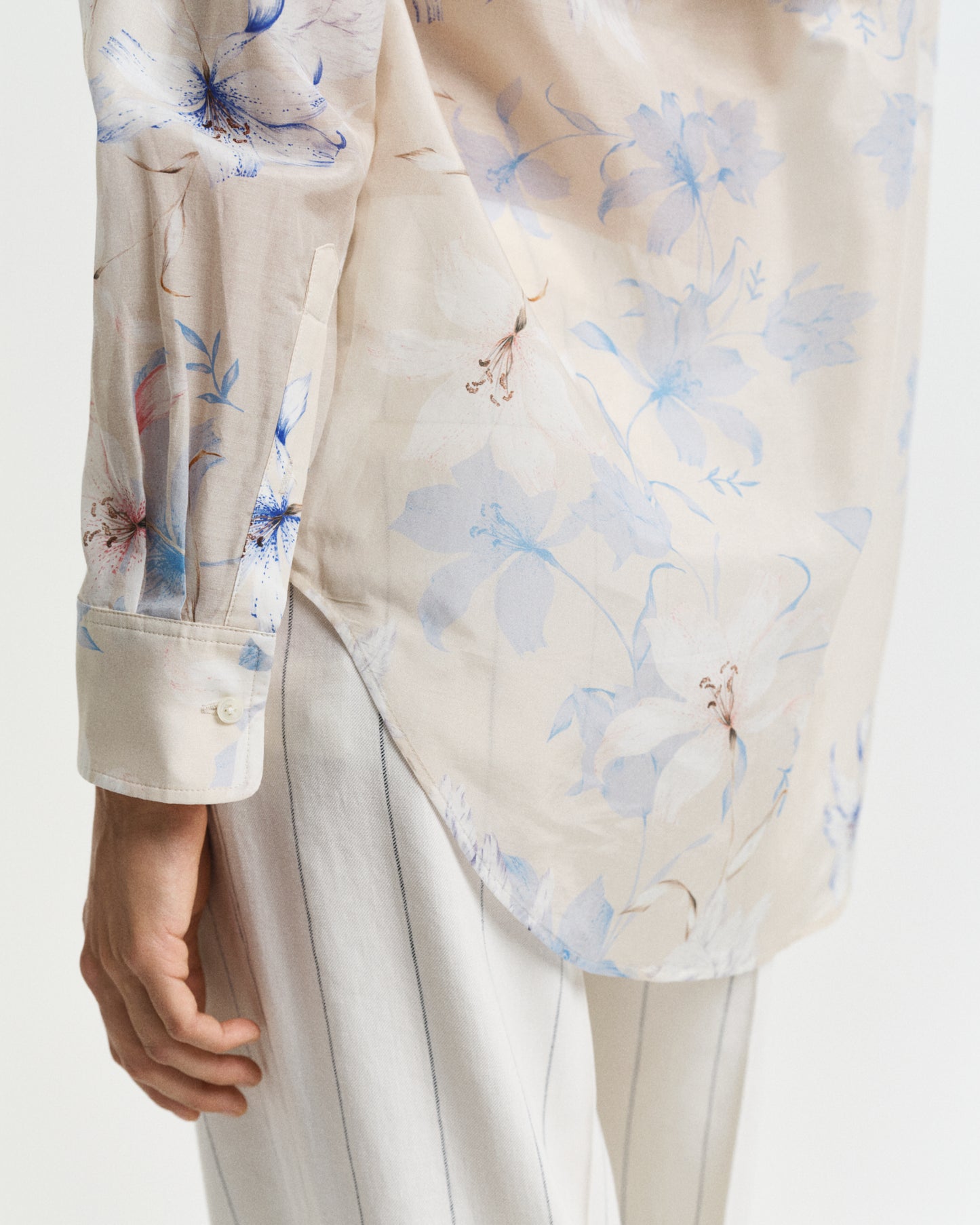 MODEL WEARING REL FLORAL PRINT COT SILK SHIRT