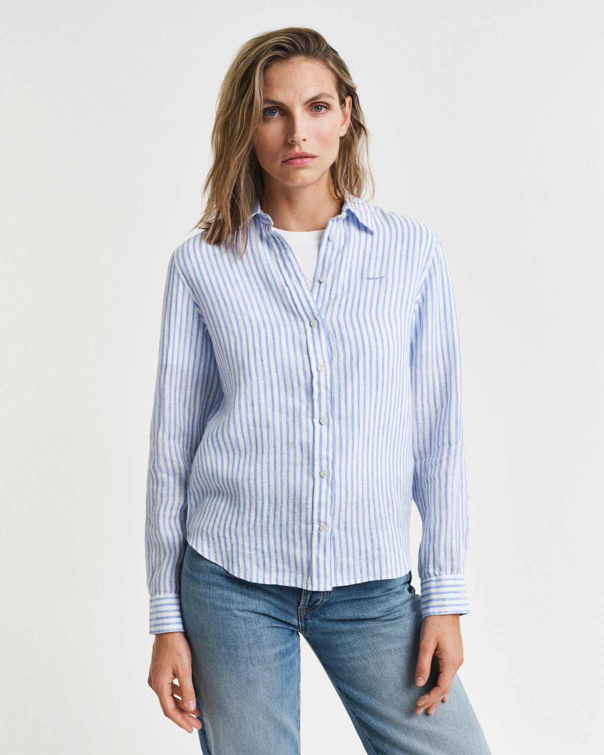 MODEL WEARING REG LINEN STRIPED SHIRT