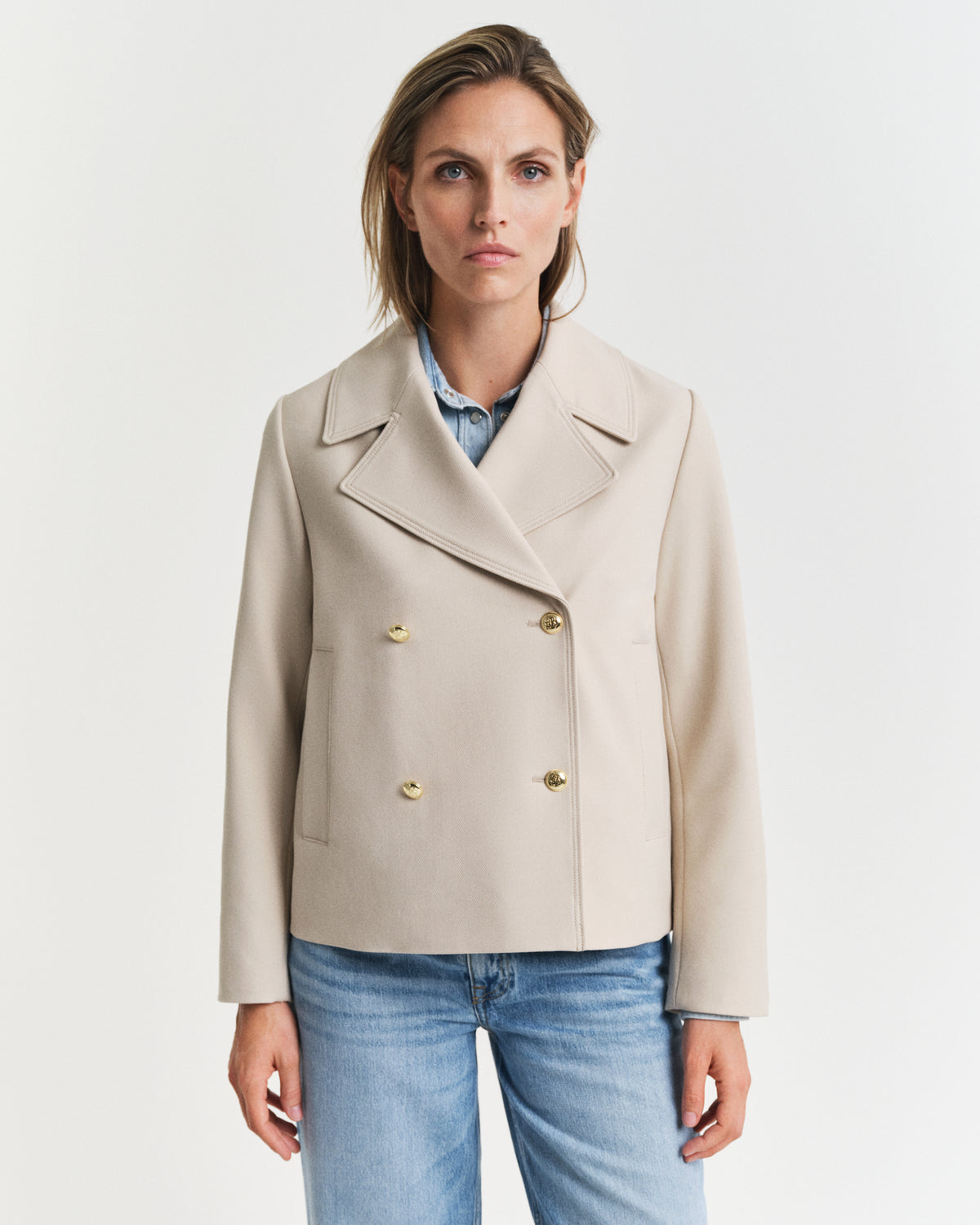 MODEL WEARING SPRING PEACOAT