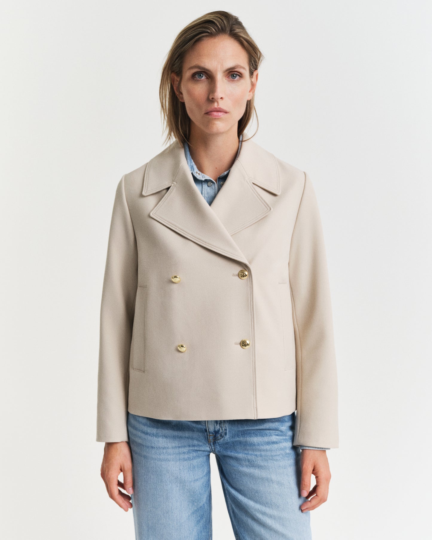 MODEL WEARING SPRING PEACOAT