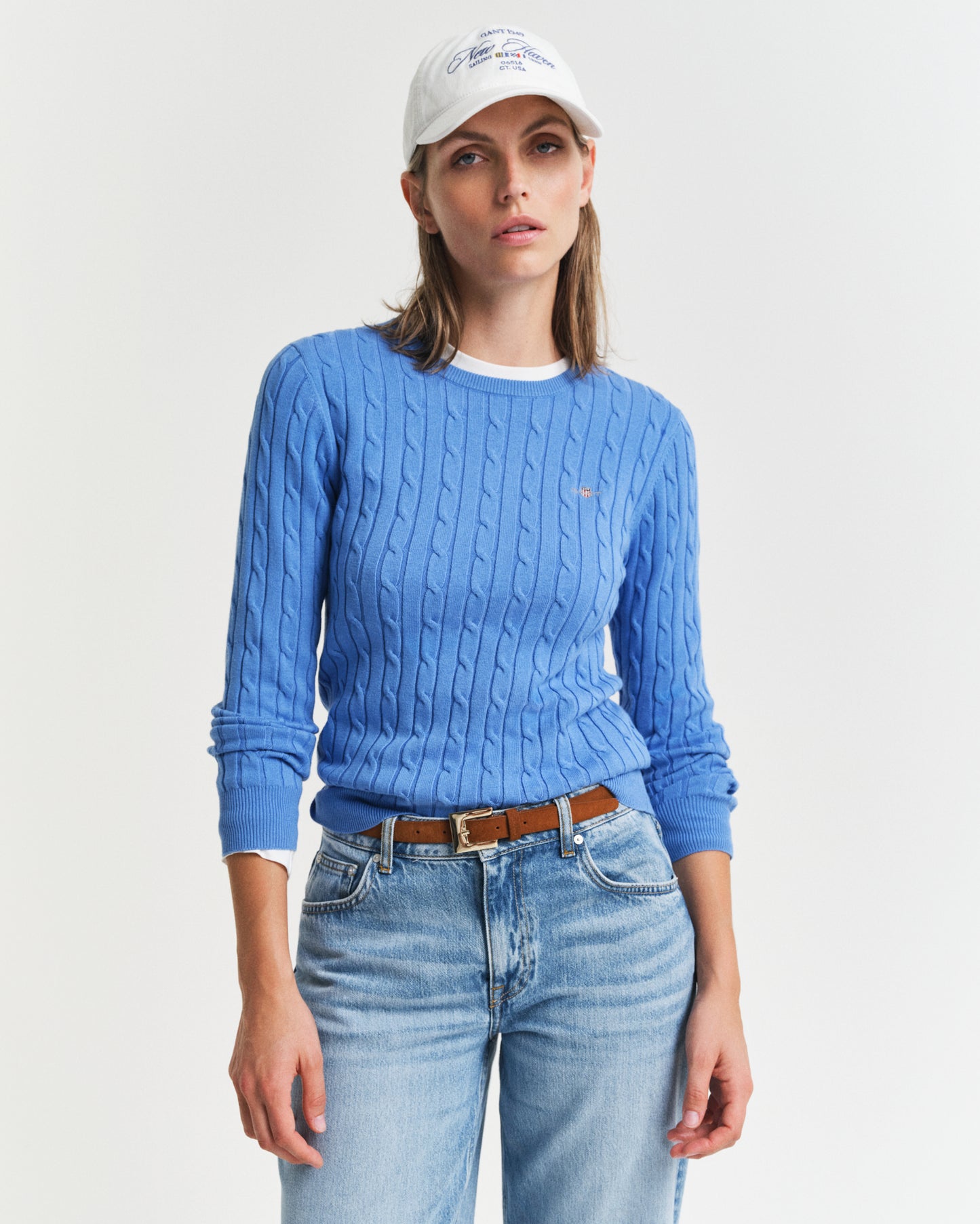 MODEL WEARING STRETCH COTTON CABLE C-NECK