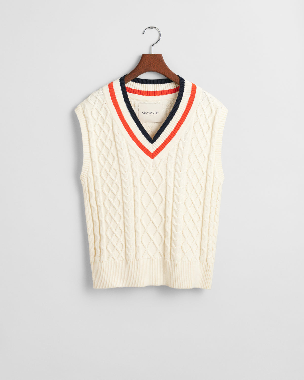 CREAM, CONTRAST CABLE V-NECK VEST, FLAT-LAY BY GANT AU.