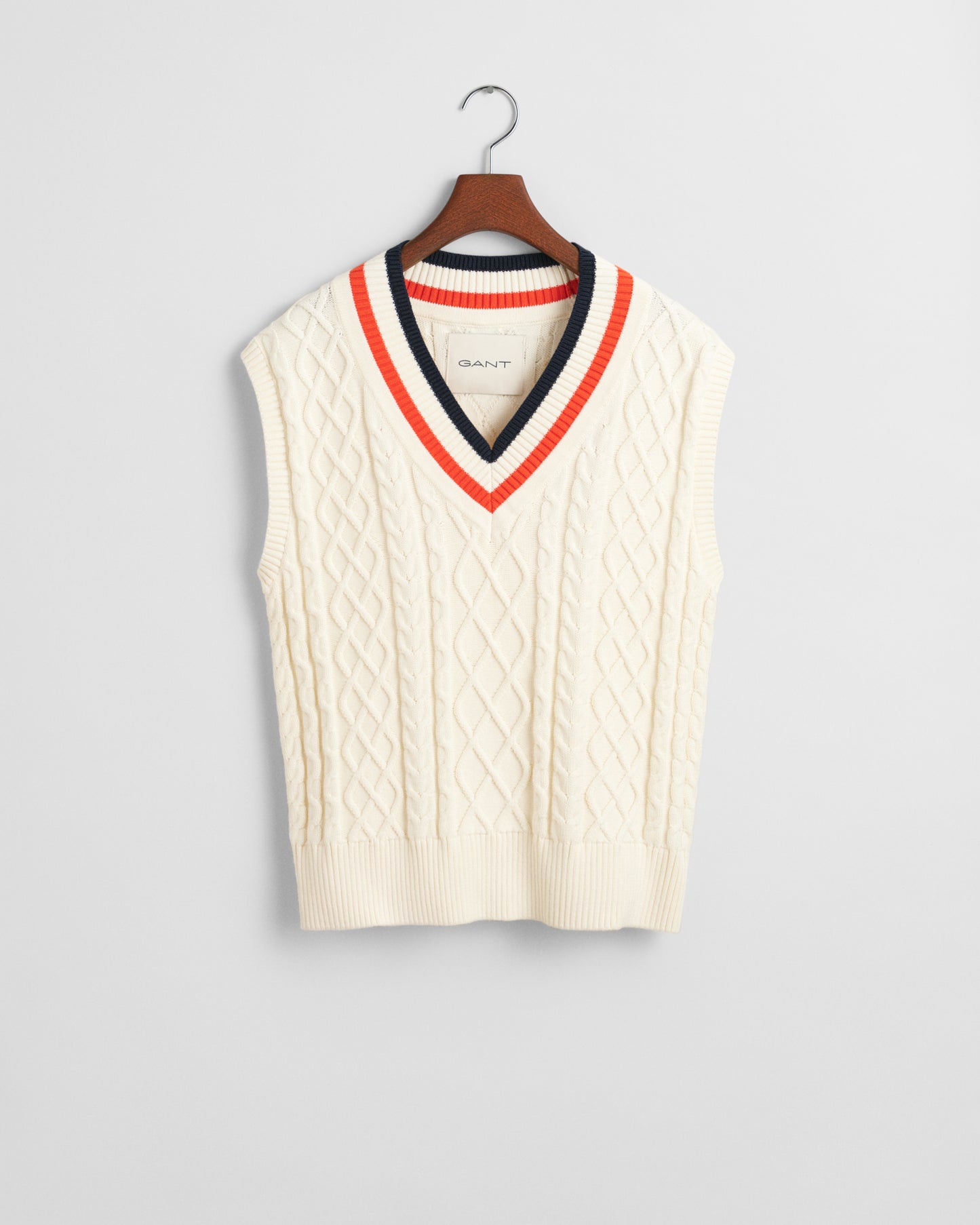 CREAM, CONTRAST CABLE V-NECK VEST, FLAT-LAY BY GANT AU.
