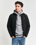 BLACK, QUILTED WINDCHEATER, FRONT-VIEW BY GANT AU.