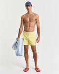 BANANA YELLOW, SWIM SHORTS BY GANT AU.