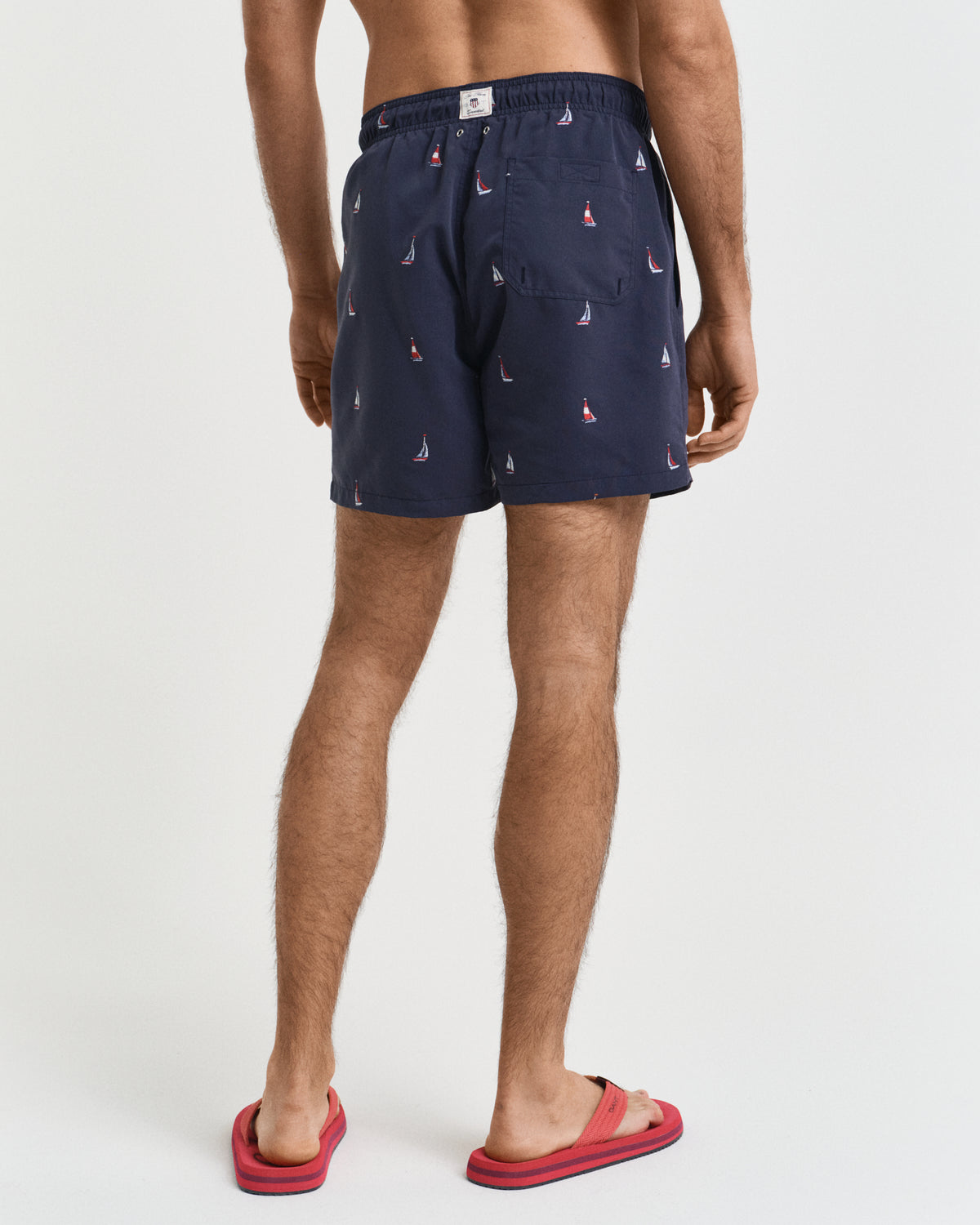 EVENING BLUE, BOAT EMBROIDERY SWIM SHORTS, BACK-VIEW BY GANT AU.
