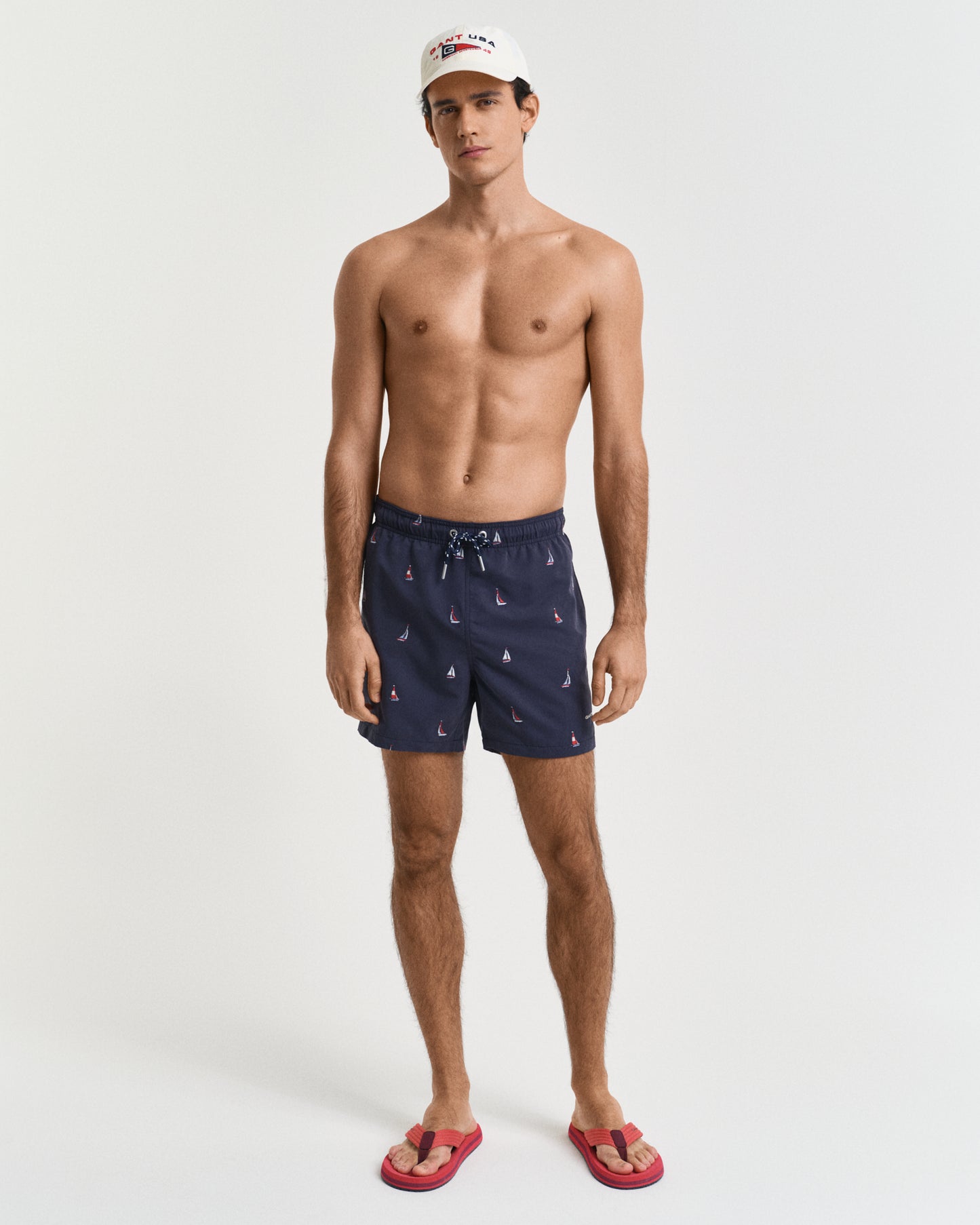 EVENING BLUE, BOAT EMBROIDERY SWIM SHORTS BY GANT AU.