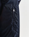 MODEL WEARING LIGHT DOWN VEST