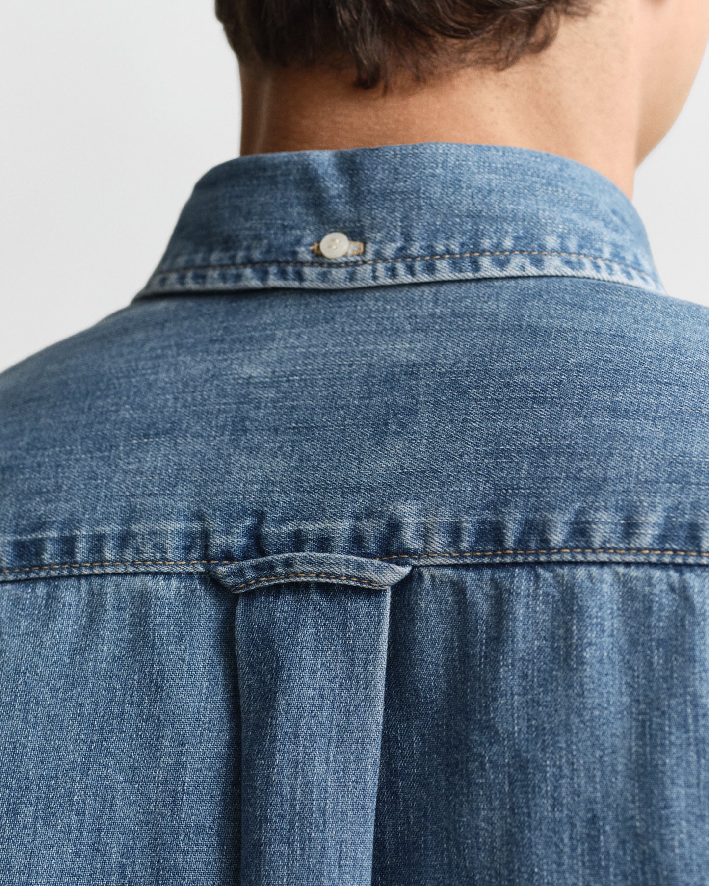 MODEL WEARING REG DENIM SHIRT
