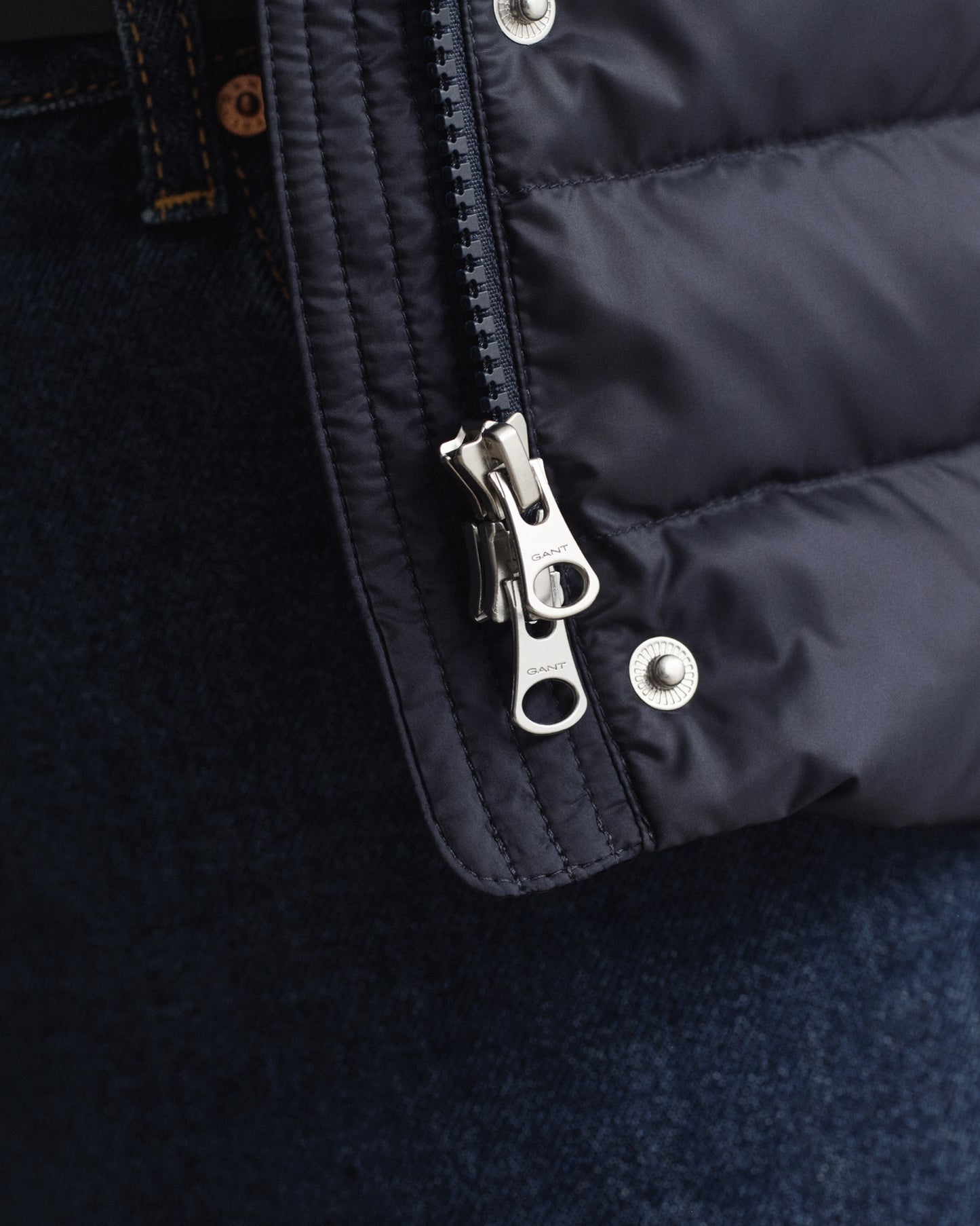 MODEL WEARING LIGHT DOWN VEST