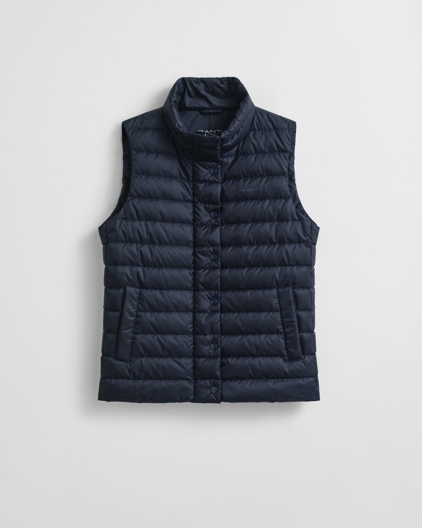 EVENING BLUE, LIGHT DOWN VEST, FLAT-LAY BY GANT AU.