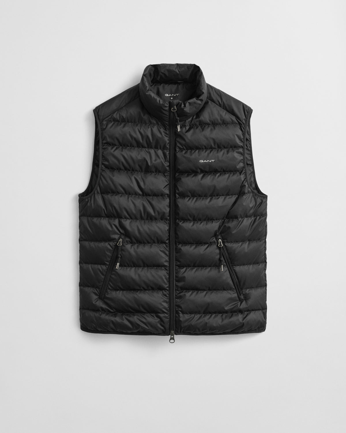BLACK, LIGHT DOWN VEST, FLAT-LAY BY GANT AU.