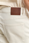 MODEL WEARING Regular Jeans