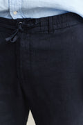 MODEL WEARING Linen Pants