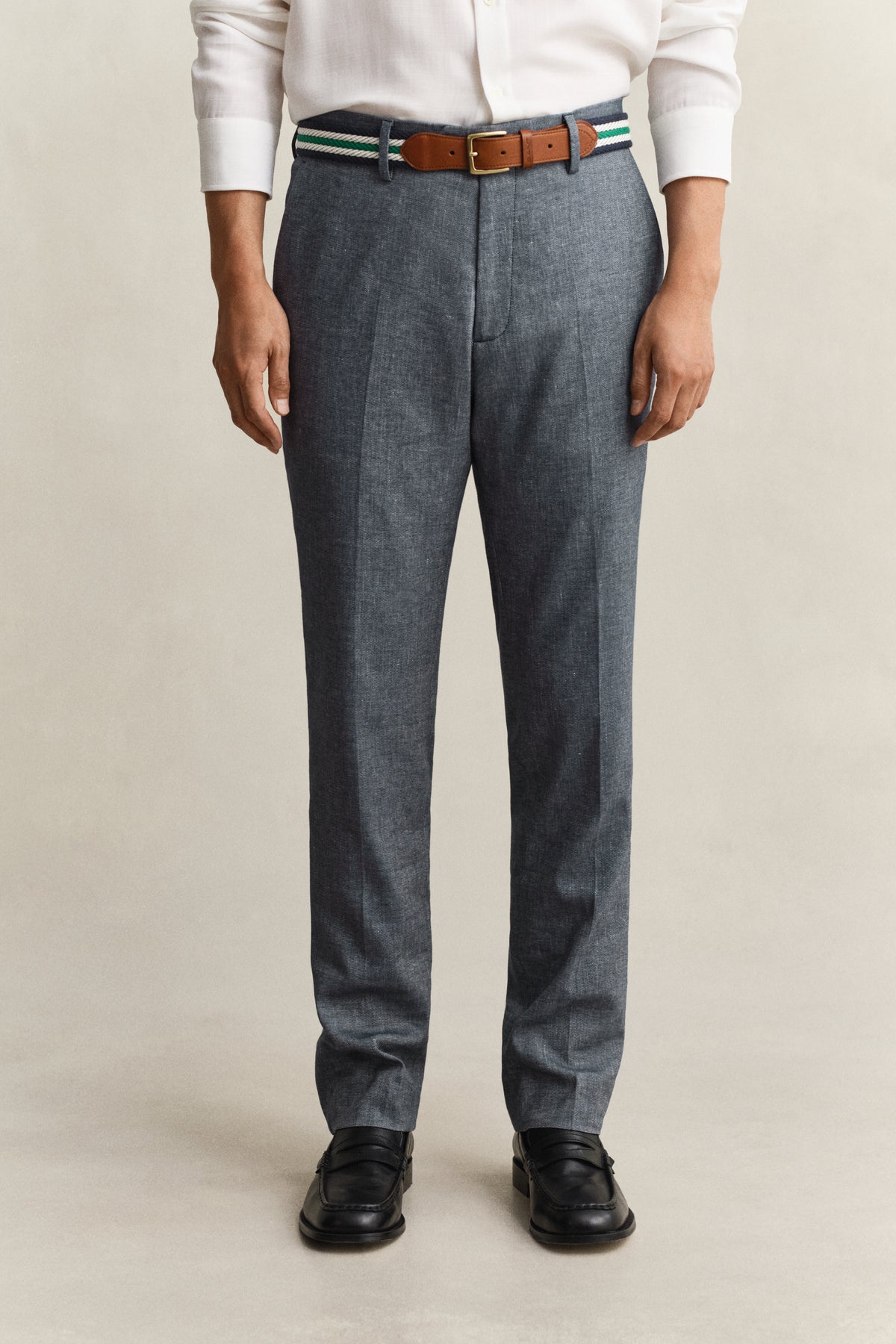 MODEL WEARING INDIGO HERRINGBONE SUIT PANTS