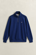 RICH NAVY, REG SHIELD HALF ZIP SWEAT, FLAT-LAY BY GANT AU.
