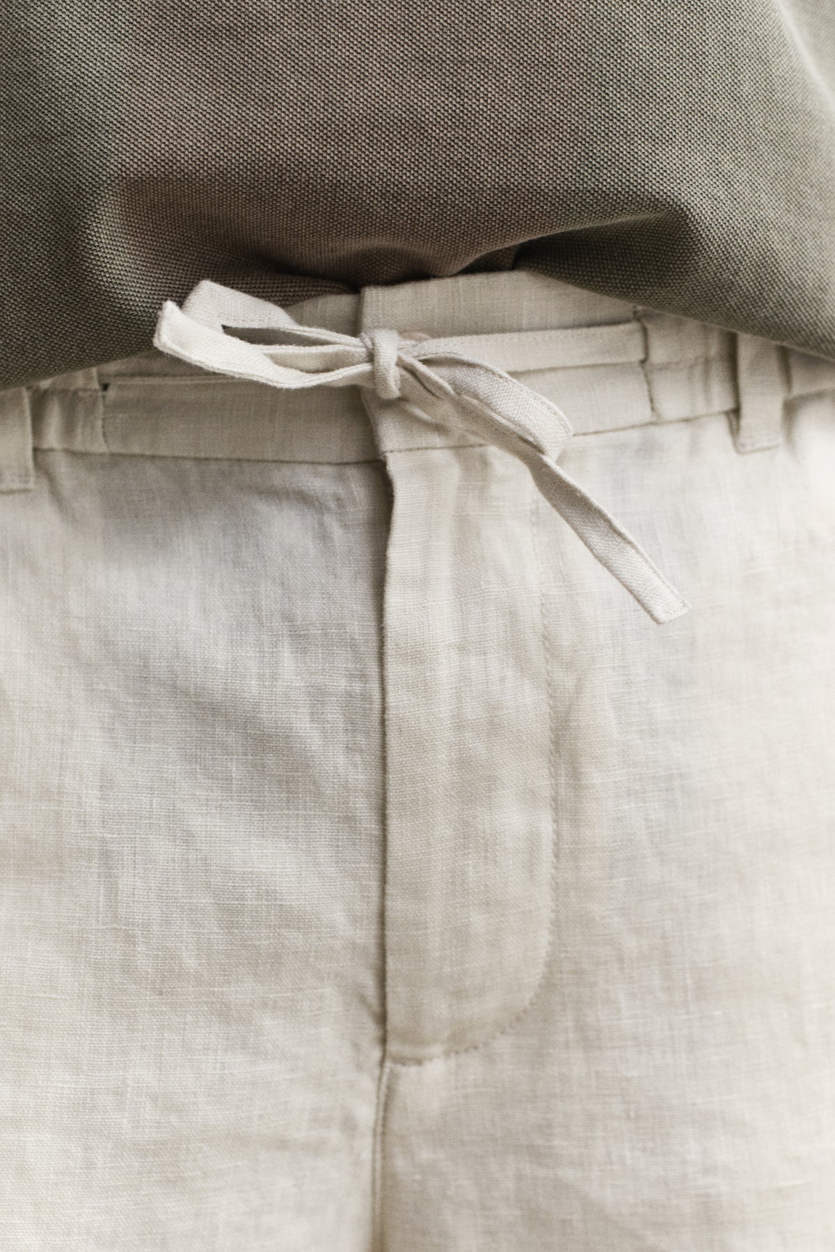 MODEL WEARING Linen Shorts