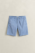 FADED DENIM, REG SUNFADED CHINO SHORTS, FLAT-LAY BY GANT AU.