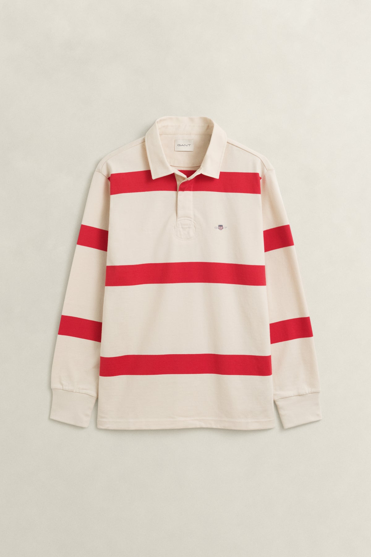 CREAMED WHITE, STRIPED RUGGER BY GANT AU.