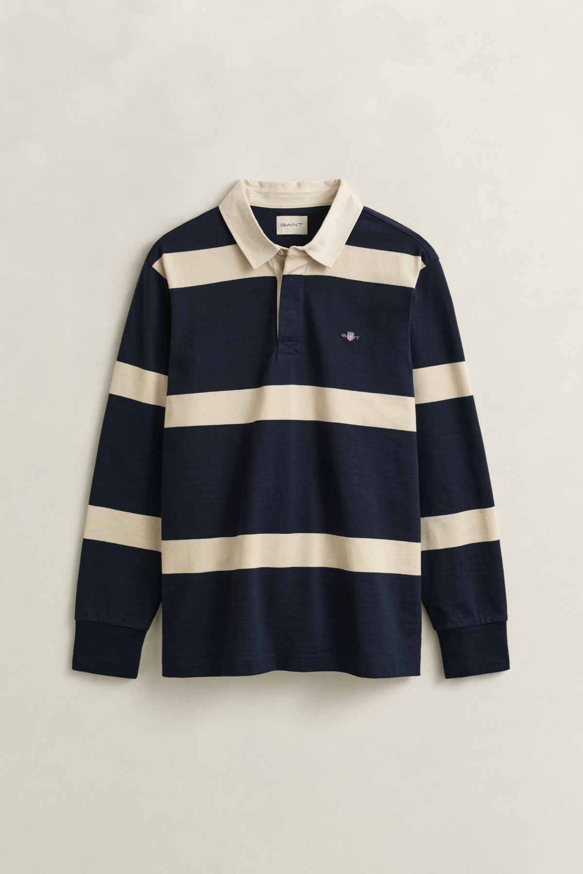 EVENING BLUE, STRIPED RUGGER, FLAT-LAY BY GANT AU.